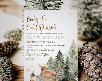 May include: A baby shower invitation with the text "Baby it's Cold Outside" in gold script. The invitation features a watercolor illustration of a fawn, pine trees, and a lantern. The details include the date, time, and location of the baby shower.