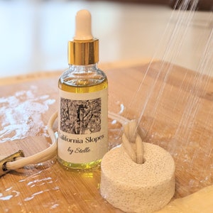 Californische hellingen-etherische oliemix, doucheverspreidersteen, lavasteendoucheverspreider, aromatherapiedouche, douchestomerverspreider.