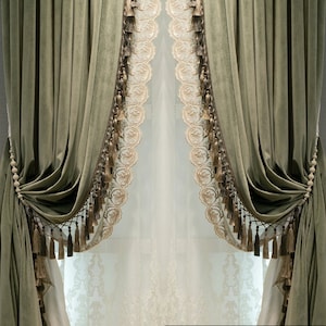 May include: Olive green velvet curtains with decorative trim and tassels. The curtains are draped and held with beaded tiebacks. A sheer, embroidered panel is visible behind the curtains, adding a layer of elegance to the window treatment.