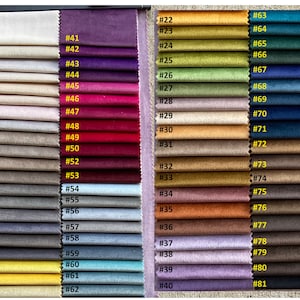 May include: A fabric color swatch chart featuring 81 different fabric samples in a variety of colors. The samples are arranged in vertical columns and labeled with numbers. Colors range from neutral tones to vibrant hues.