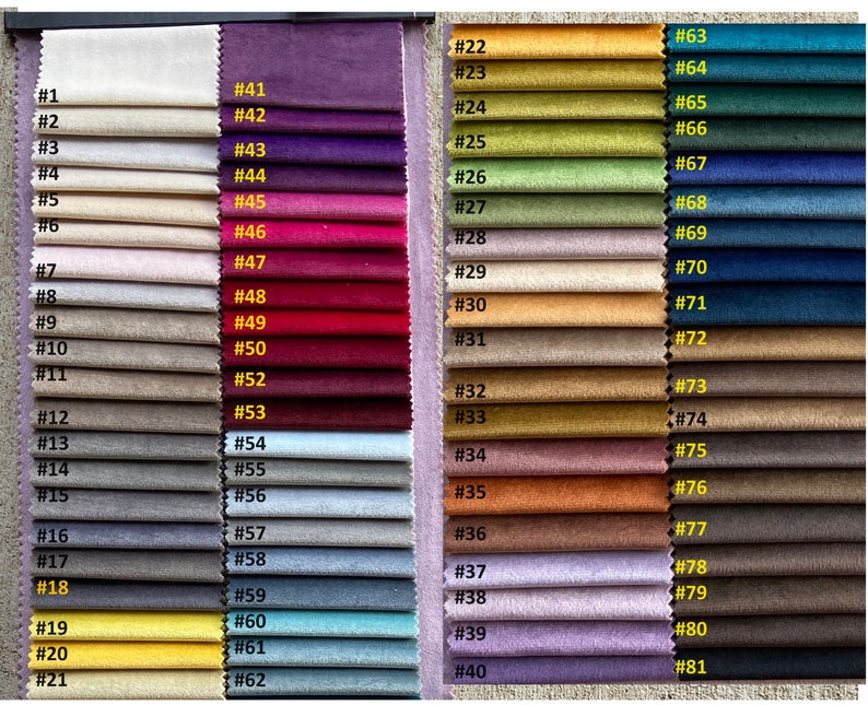 May include: A fabric color swatch chart featuring 81 different fabric samples in a variety of colors. The samples are arranged in vertical columns and labeled with numbers. Colors range from neutral tones to vibrant hues.