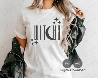 May include: A white t-shirt with the word "Witchy" in black text with a crescent moon and stars. The text is in a bold, blocky font. The shirt is being worn by a person with long blonde hair and a black leather jacket.