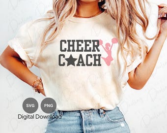May include: A white t-shirt with the text "CHEER COACH" in black with a black star and a pink silhouette of a cheerleader. The text "SVG" and "PNG" are visible below the image.