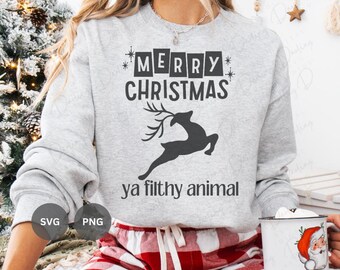 May include: A gray sweatshirt with the text "Merry Christmas ya filthy animal" in black lettering. A black silhouette of a reindeer is above the text.