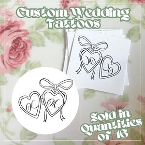 May include: Custom wedding tattoos featuring two connected heart-shaped pendants with initials and a bow. The tattoos are black and white and sold in quantities of 16. The text "Custom Wedding Tattoos" is at the top of the image.