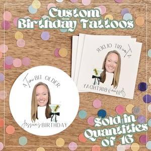 May include: Custom birthday tattoos featuring a woman's face with a martini glass illustration. The text reads "A Tiny Bit Older" and "Jessica's Birthday". Sold in quantities of 16. The design is on a white circle and square cards.
