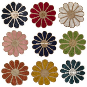May include: Nine round jute flower-shaped doormats in various colors, including navy blue, red, white, pink, green, orange, yellow, and teal.
