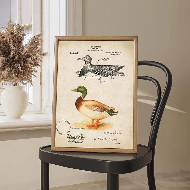Vintage duck decoy wall art featuring a 1910 patent sketch and watercolor illustration of a mallard drake. Perfect for farmhouse, rustic, lodge, or hunting-themed decor. This antique bird print is a high-resolution digital download for instant use. Ideal for vintage art lovers, birdwatchers, or as a Father's Day gift. Styled for cottagecore, nature-inspired, or Americana interiors. Unique historical artwork to enhance your space with charm and character.