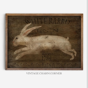 May include: A vintage-style sign with a white rabbit running across a dark brown background. The sign reads "White Rabbit Inn Est. 1784" and has a decorative border of vines.
