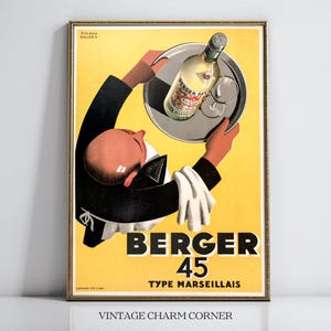 May include: Vintage-style framed print featuring a waiter holding a tray with a bottle of Berger 45 and a glass. The poster has a yellow background with black text and a gold frame. The text reads "BERGER 45 TYPE MARSEILLAIS".