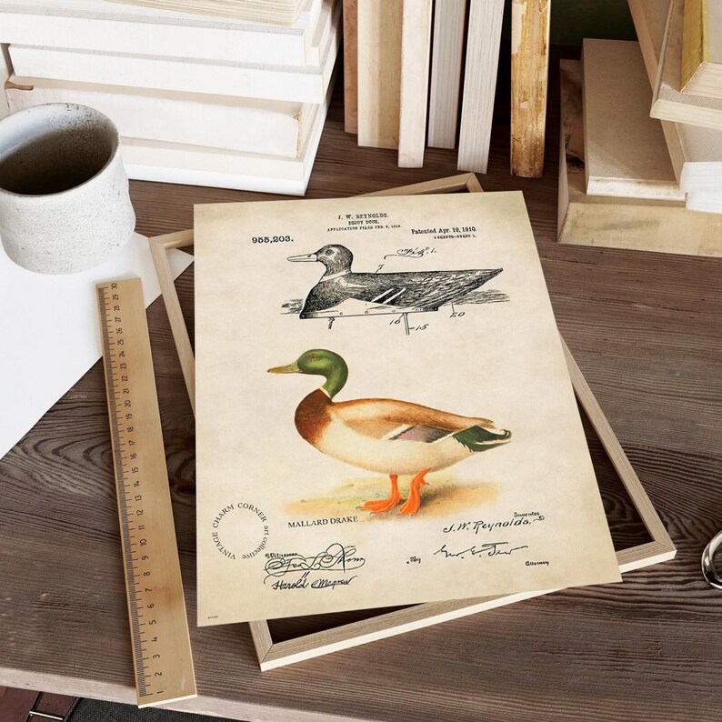 Vintage duck decoy wall art featuring a 1910 patent sketch and watercolor illustration of a mallard drake. Perfect for farmhouse, rustic, lodge, or hunting-themed decor. This antique bird print is a high-resolution digital download for instant use. Ideal for vintage art lovers, birdwatchers, or as a Father's Day gift. Styled for cottagecore, nature-inspired, or Americana interiors. Unique historical artwork to enhance your space with charm and character.