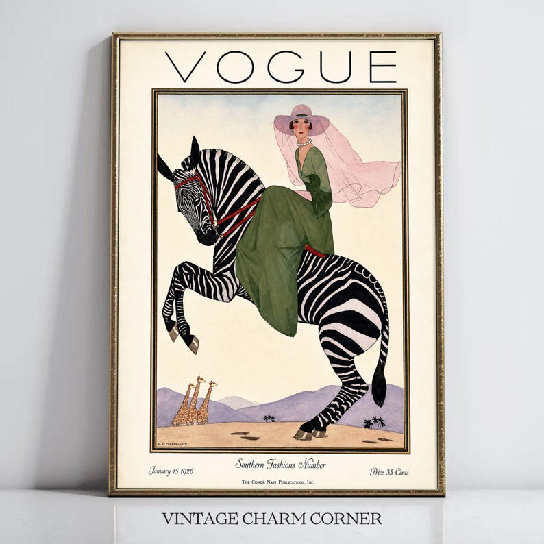 Digitally restored 1926 Vogue magazine cover titled Southern Fashions Number, featuring a stylish woman in a flowing green dress and pink hat riding a zebra in a desert landscape with giraffes and mountains. Vintage Art Deco fashion illustration digital download ideal for gallery walls, eclectic decor, and gifts for fashion history and vintage art lovers.