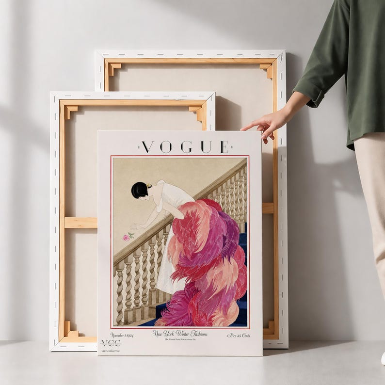 Digital Download Of A November 1 1924 Vogue Cover By George Wolfe Plank Showing An Art Deco Woman In A White Winter Gown Leaning Over A Staircase Toward A Pink Rose With Dramatic Pink Feathered Train. Printable Vintage Wall Decor For Cottagecore Farmhouse Glam Gallery Walls Fashion History Lovers And Gift Buyers.
