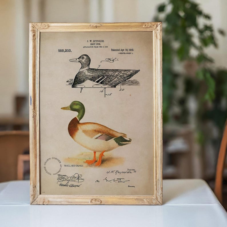Vintage duck decoy wall art featuring a 1910 patent sketch and watercolor illustration of a mallard drake. Perfect for farmhouse, rustic, lodge, or hunting-themed decor. This antique bird print is a high-resolution digital download for instant use. Ideal for vintage art lovers, birdwatchers, or as a Father's Day gift. Styled for cottagecore, nature-inspired, or Americana interiors. Unique historical artwork to enhance your space with charm and character.