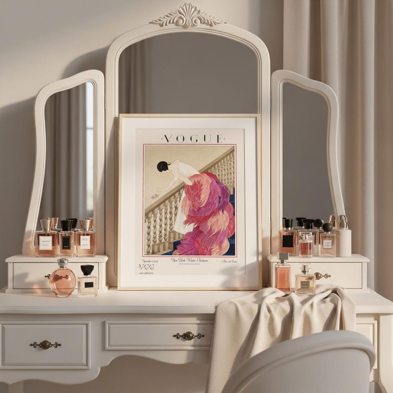 Digital Download Of A November 1 1924 Vogue Cover By George Wolfe Plank Showing An Art Deco Woman In A White Winter Gown Leaning Over A Staircase Toward A Pink Rose With Dramatic Pink Feathered Train. Printable Vintage Wall Decor For Cottagecore Farmhouse Glam Gallery Walls Fashion History Lovers And Gift Buyers.
