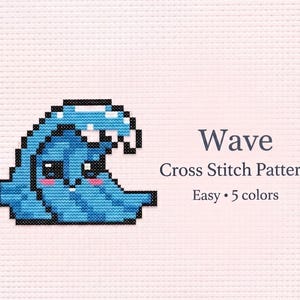 Può includere: Schema a punto croce raffigurante un'onda blu pixelata con un volto sorridente e guance rosa. Il testo "Wave Cross Stitch Pattern Easy • 5 colori" è visualizzato in un carattere grigio scuro.