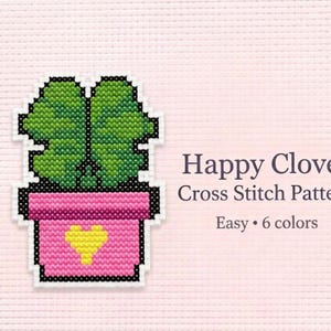 Può includere: Un modello a punto croce con un quadrifoglio verde in un vaso rosa con un cuore giallo. Il testo recita "Happy Clover Cross Stitch Pattern" e "Easy • 6 colori". Il disegno è su uno sfondo rosa chiaro.
