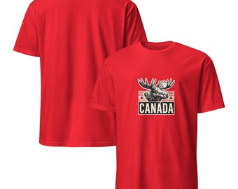 May include: Red t-shirt with a moose graphic and the word "CANADA" printed on the front. The back of the shirt is plain.
