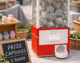 Máquina expendedora de cápsulas compactas, sistema de premios con fichas personalizadas para niños y adultos.