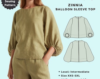 Może przedstawiać: Wykrój krawiecki w formacie PDF dla bluzki Zinnia Balloon Sleeve Top marki Tiana's Closet. Obraz przedstawia szałwiowo-zieloną bluzkę z obszernymi rękawami, okrągłym dekoltem i szwem środkowym. Zawiera rysunki techniczne, poziom średniozaawansowany, rozmiary XXS-5XL.