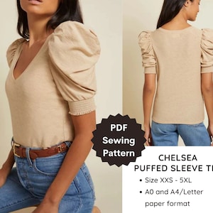 Può includere: Un cartamodello di cucito PDF per una maglietta beige Chelsea a maniche a sbuffo. Il cartamodello include le taglie dalla XXS alla 5XL ed è disponibile in formato carta A0 e A4/Letter.