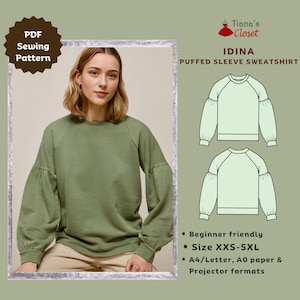 May include: A sewing pattern for a green puffed sleeve sweatshirt called "Idina". The pattern is beginner friendly and includes sizes XXS-5XL. The pattern is available in A4/Letter, A0 paper, and projector formats.