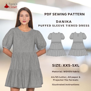 May include: A PDF sewing pattern for a tiered dress with puffed sleeves. The pattern is called "Danika" and is available in sizes XXS-5XL. The pattern is for woven fabric and includes instructions for cutting and sewing the dress. The pattern is available in A4/US Letter, A0 paper, and projector file formats.