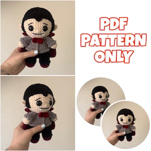 May include: A crochet vampire doll with black hair, a grey jacket, a red bow tie, and a red-lined cape. The doll has large black eyes and visible white fangs. The text PDF PATTERN ONLY is displayed in orange letters on the right side of the image.