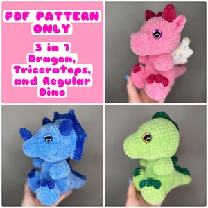 May include: A collection of three crocheted dinosaur plushies in pink, blue, and green, with large, round eyes. The image also includes a pink square with the text "PDF PATTERN ONLY" and "3 in 1 Dragon, Triceratops, and Regular Dino."