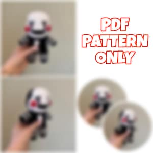 May include: A plush doll with a white face, red cheeks, and a black outfit. The text "PDF PATTERN ONLY" is displayed in orange. The doll is held in a hand in multiple images.