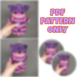 May include: A purple and pink crocheted Cheshire Cat plushie. The plushie has a striped body, a wide grin, and is held in a hand. The image also includes the text "PDF PATTERN ONLY" in orange and purple.