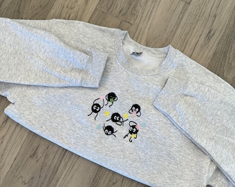 Anime-inspired embroidered pullover sweater