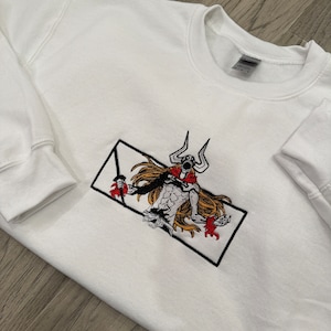 Anime-inspired embroidered pullover sweater