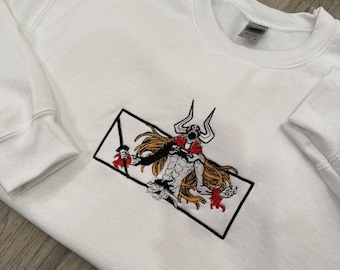 Sweter z haftem inspirowanym anime