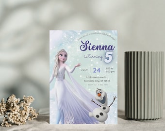 May include: A Frozen-themed birthday invitation with a blue and white background. The invitation features a picture of Elsa from Frozen and Olaf. The text on the invitation reads "Sienna is turning 5" and includes the date, time, and location of the party.