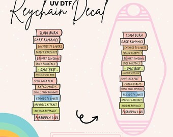 May include: A pink keychain decal with a stack of books featuring different romance novel titles. The decal is ready to apply, peel and stick.