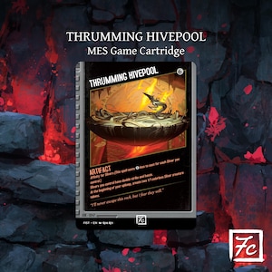 May include: A game cartridge labeled "THRUMMING HIVEPOOL" with a stylized illustration of a bowl with a creature inside. The card is black and white with red accents and text. The text includes "MES Game Cartridge" and "ARTIFACT".