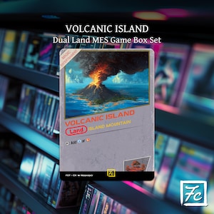 May include: A rectangular game card titled Volcanic Island Dual Land MES Game Box Set. The card features an illustration of a volcano erupting over an island, with text reading Volcanic Island, Land, Island Mountain, and a symbol for adding mana.