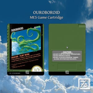 May include: A green MES game cartridge with the text "OUROBOROID" and a green plant worm graphic. The cartridge has a warning label and the number "1/3".