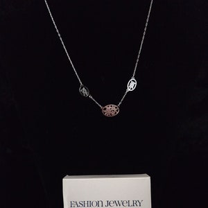 Avon 1981 Engraved Silver Tone Necklace