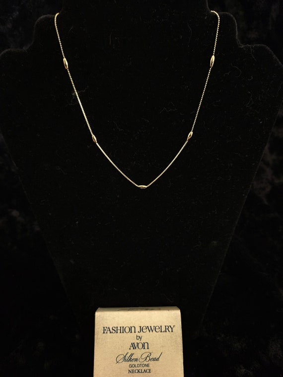 Avon 1980 Silken Bead Goldtone Necklace