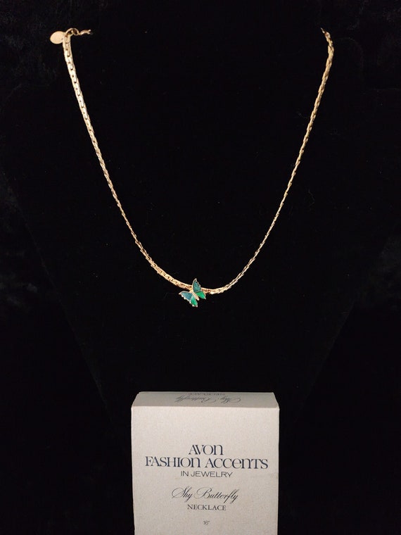 Avon butterfly necklace deals