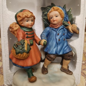 Avon 1981 Sharing the Christmas Spirit Figure