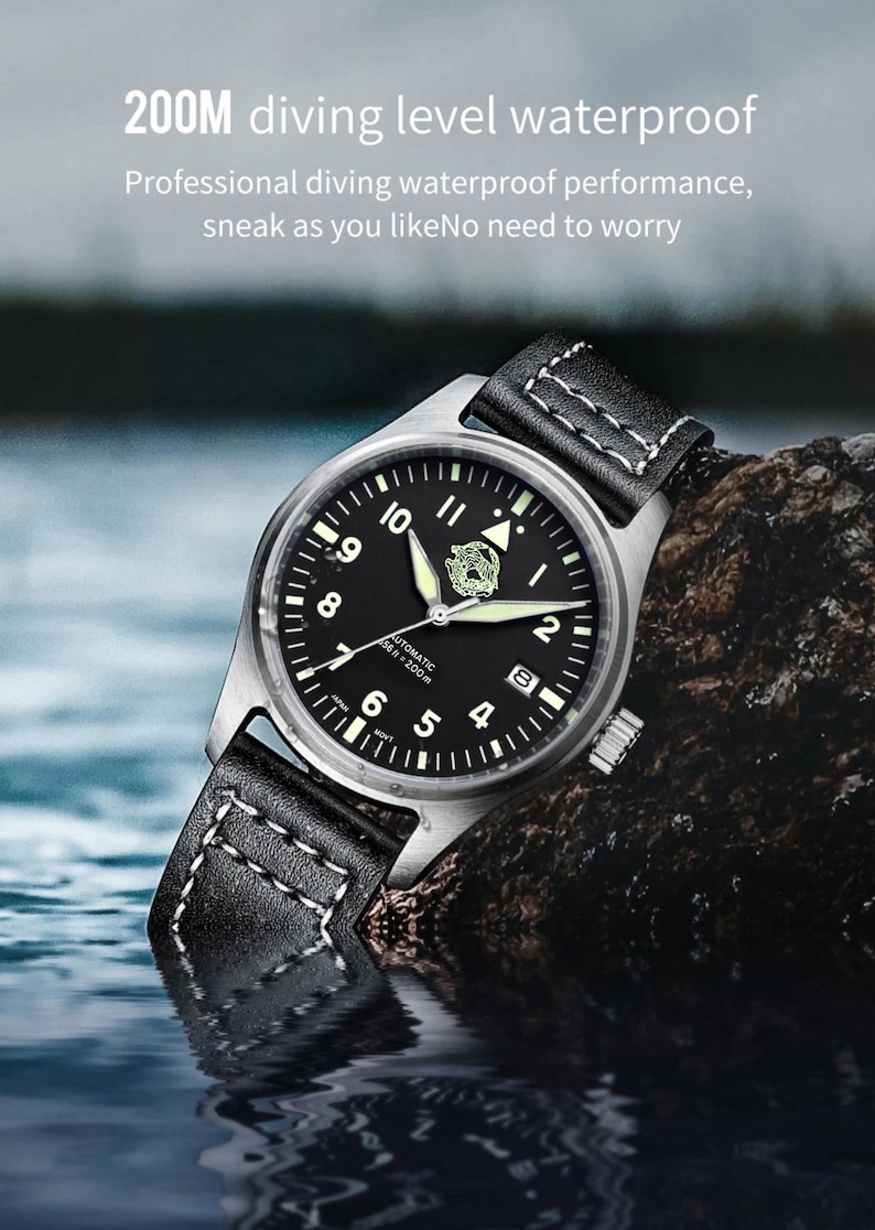 May include: A black-faced wristwatch with a stainless steel case and a black leather strap. The watch features luminous hands and markers, a date window, and the text "200M diving level waterproof". The watch is designed for professional diving.