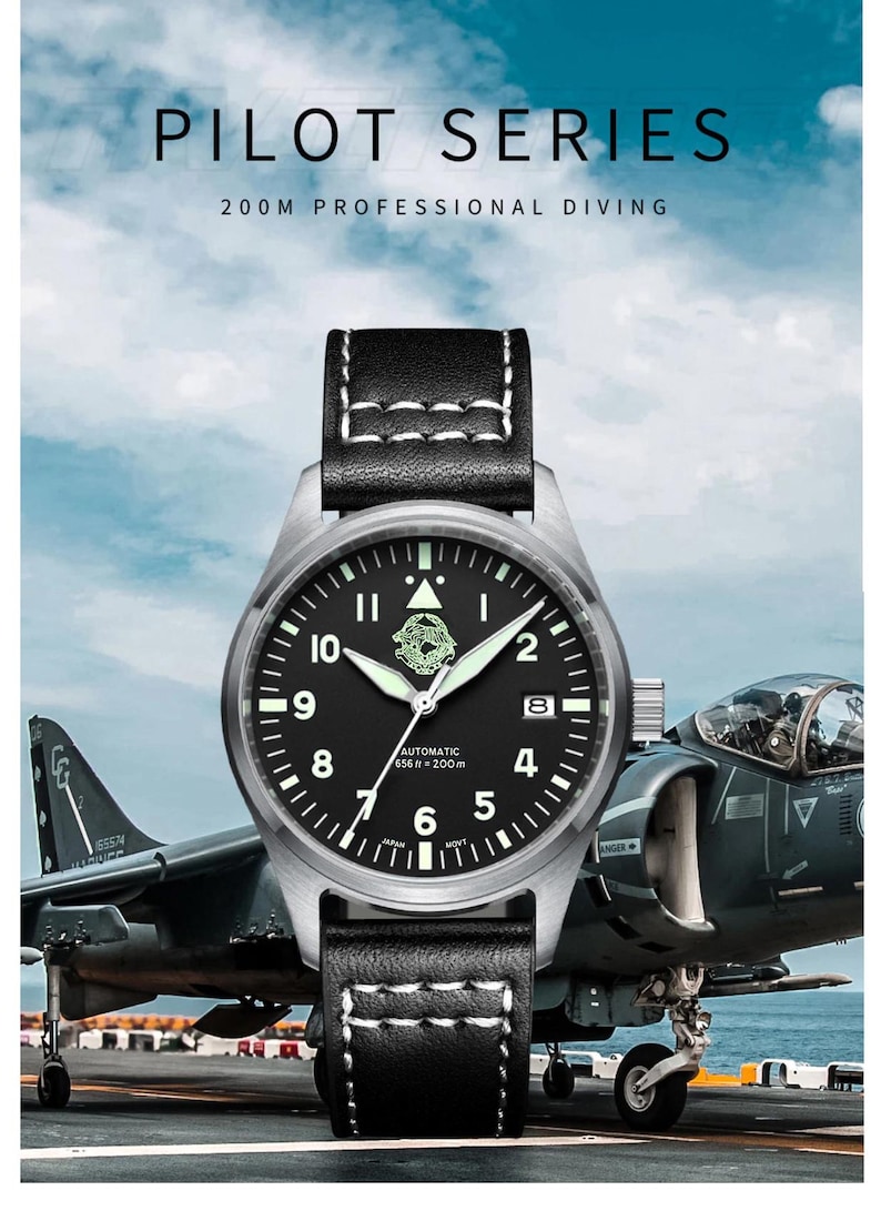 May include: A pilot's watch with a black face, stainless steel casing, and a black leather strap. The watch has luminous hands and markers. The text "PILOT SERIES" is displayed. The background shows a fighter jet.