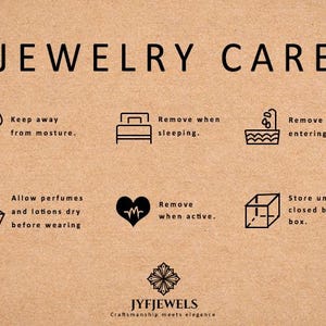 May include: A tan-colored card with the words "JEWELRY CARE" in black. The card features six icons with instructions: keep away from moisture, remove when sleeping, remove before entering water, allow perfumes and lotions to dry before wearing, remove when active, and store in a closed bag or box.