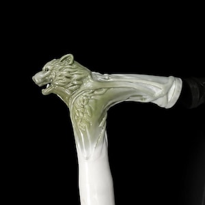 Wooden wolf head walking stick.  Custom handmade carved cane.