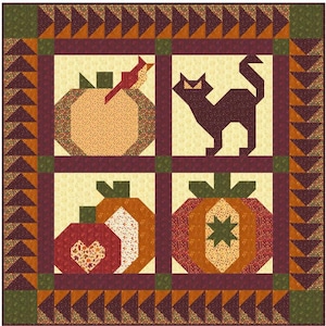 Puede incluir: Un edredón de retazos con cuatro cuadrados que representan escenas otoñales. Los cuadrados presentan calabazas, un gato negro y un pájaro. El edredón tiene un borde de triángulos en tonos naranja, verde y marrón.