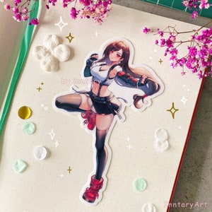 May include: A sticker featuring a female anime character with long brown hair, wearing a white tank top, black shorts, and red boots. The character is in a fighting pose with her right leg raised and her left arm extended. The sticker is on a white background with gold stars and white dots.