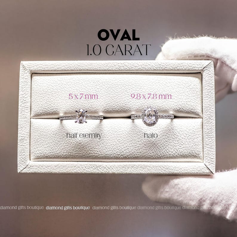 two diamond rings displayed in a white jewelry box, with text indicating the size of the rings.